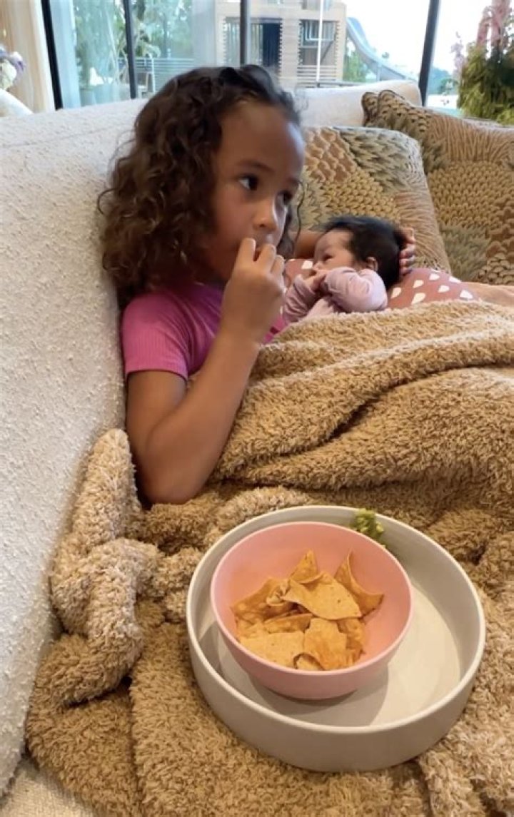 Chrissy Teigen’s Daughter Luna, 4, Plays With Mom’s Growing Baby Bump & Says ‘Hi Baby’ While They Cook