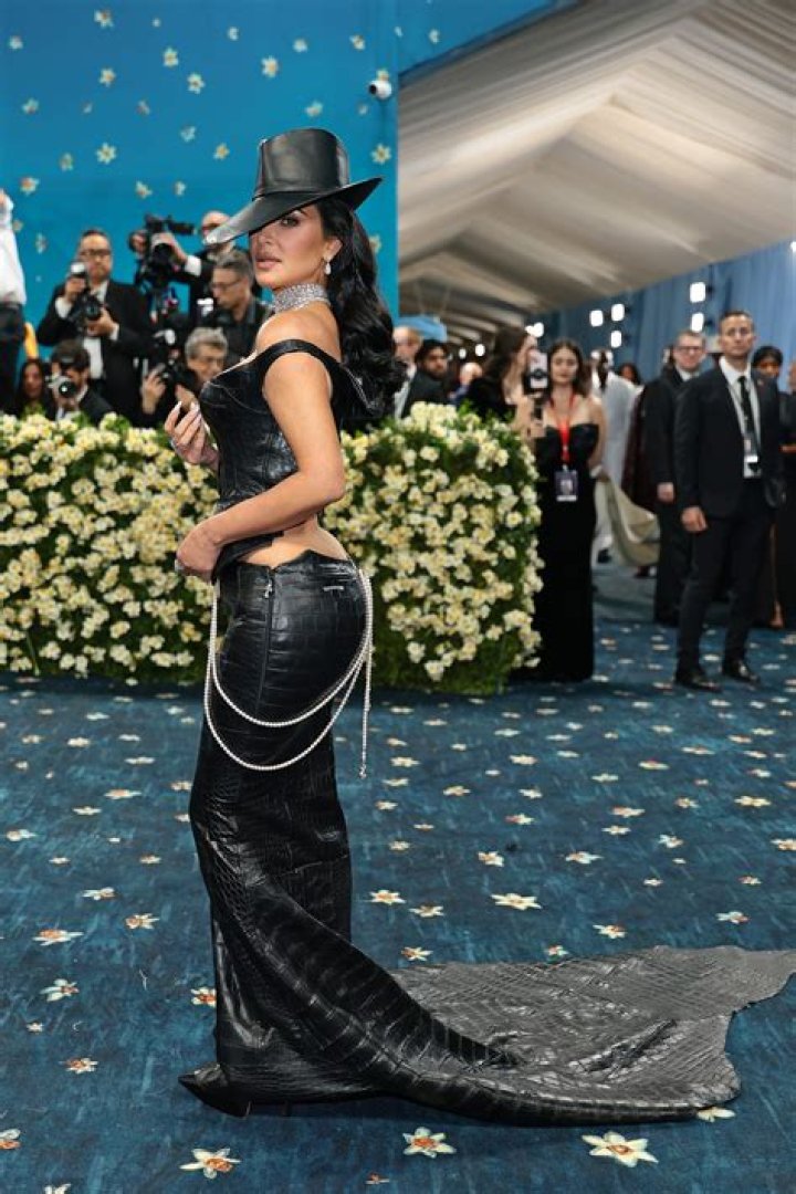 Kim Kardashian Looks Fierce In Bra & Leather Pants For Dinner As Kanye & Irina Reportedly Cool Off